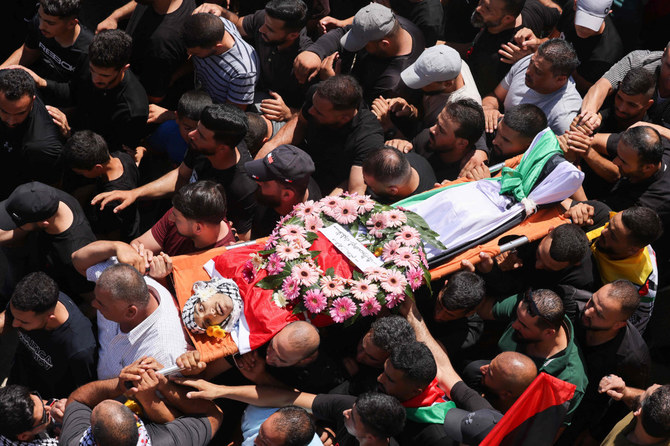 Mourners carry the body of 19-year-old Palestinian Qusai Jamal Maatan during his funeral in the village of Burqa in the north of the occupied West Bank on August 5, 2023. (AFP)