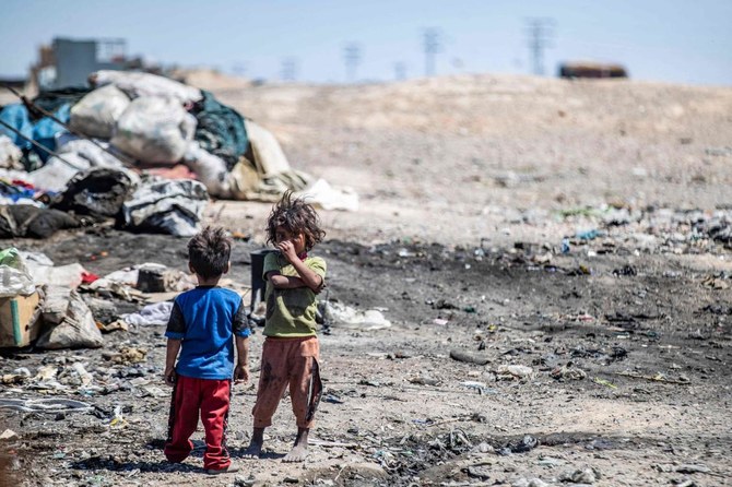 Thousands of people displaced by 12 years of war are stuck in squalid, unofficial camps in Syria's Kurdish-held northeast, languishing in extreme poverty and largely cut off from international assistance. (File/AFP)