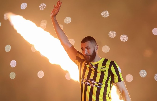 Karim Benzema greets Al-Ittihad fans at King Abdullah Sports City Stadium in Jeddah, Saudi Arabia, June 8, 2023. (AP Photo)