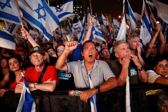 Tens of thousands of protesters have been marching in a last-ditch show of force aimed at blocking Prime Minister Benjamin Netanyahu’s contentious judicial overhaul. (Reuters)