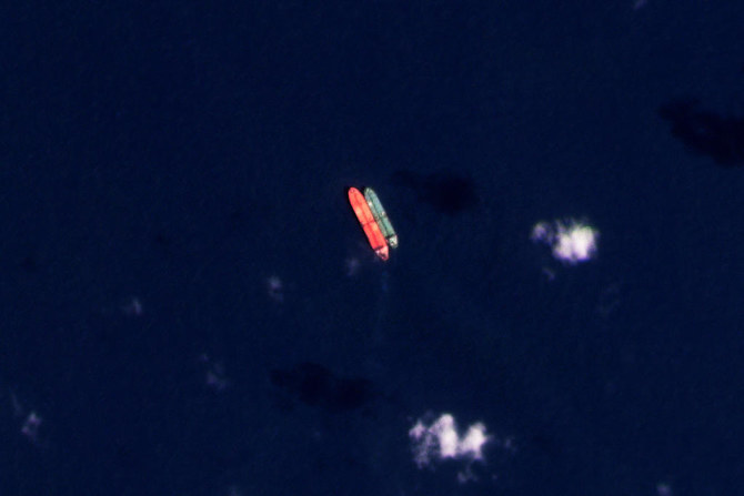 A satellite photo shows the Virgo, left, and the Suez Rajan while in the South China Sea on Feb. 13, 2022. (Planet Labs PBC via AP)