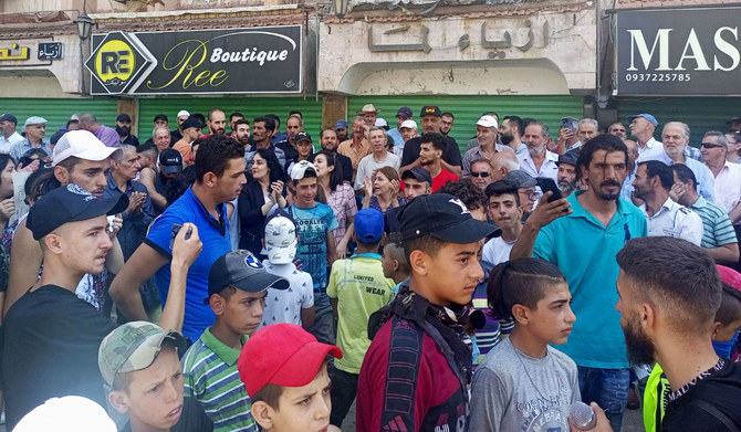 A handout picture released by the Suwayda 24 news site shows people protesting in the southern Syrian city of Suwaida on August 21, 2023. (AFP)