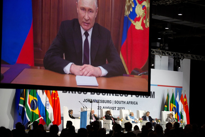 A recorded message from Russian president Vladimir Putin is aired during the BRICS Summit in Johannesburg, South Africa August 22, 2023. (Reuters)