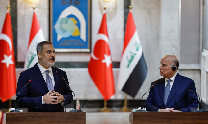 Turkey’s Foreign Minister Hakan Fidan speaks with the media after a meeting with Iraq’s Foreign Minister Fuad Hussein, in Baghdad, Iraq, August 22, 2023. (Reuters)