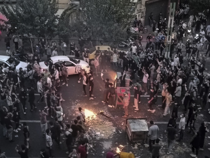 Iranians protest a 22-year-old woman Mahsa Amini's death after she was detained by the morality police, in Tehran, Sept. 20, 2022, in this photo taken by an individual not employed by the Associated Press and obtained by the AP outside Iran. (AP Photo/ File)