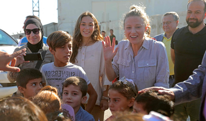 Rep. Victoria Spartz, commissioner to the US Commission on Security and Cooperation in Europe, greets orphaned children during her visit to a hospital in Syria's border town of Azaz, in the rebel-held north of Aleppo province, on August 27, 2023. (AFP)