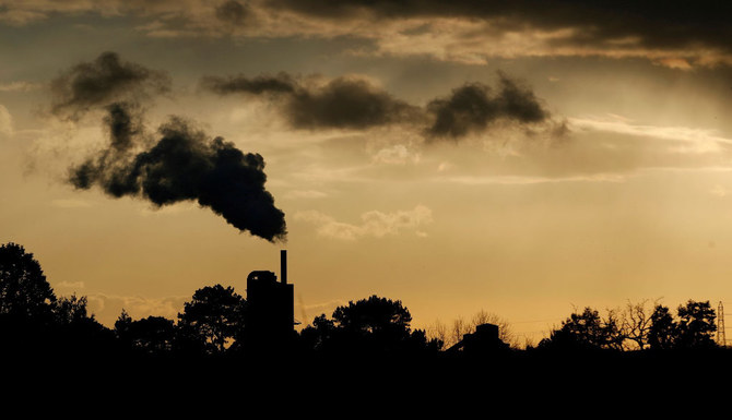 Smoke rises above a factory at sunset in Rugby, Britain. (Reuters/File)