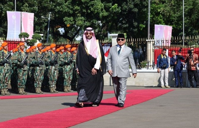 Saudi Defense Minister Prince Khalid bin Salman and Indonesian Defense Minister Prabowo Subianto walk together toward the Ministry of Defense in Jakarta on Aug. 1, 2023. (Ministry of Defense/@modgovksa)