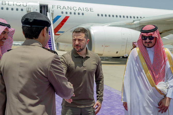 Ukraine’s President Volodymyr Zelensky greets Saudi officials in Jeddah where he arrived on May 19, 2023 to attend the Arab League Summit. (SPA/AFP)