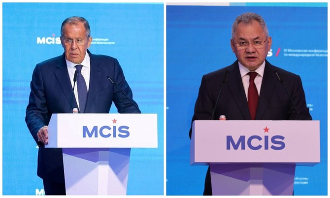 Russian foreign minister Sergey Lavrov and Russia’s defense minister Sergei Shoigu speaking at the MCIS conference in Moscow. (MFA/MID)