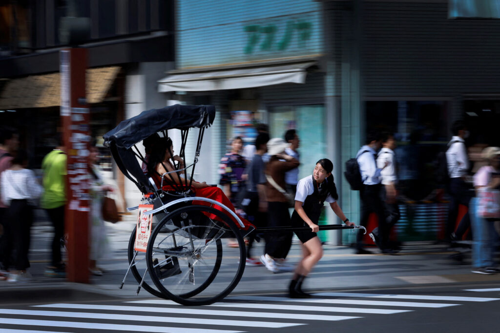 In addition to being physically strong, rickshaw pullers must have extensive knowledge of Tokyo and know how to engage the tourists who mostly hire them for sightseeing. (Reuters)