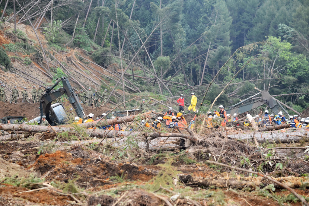 Self defence forces search for missing people in Atsuma on September 9, 2018 following a 6.6-magnitude earthquake that hit the island of Hokkaido on September 6. (AFP)