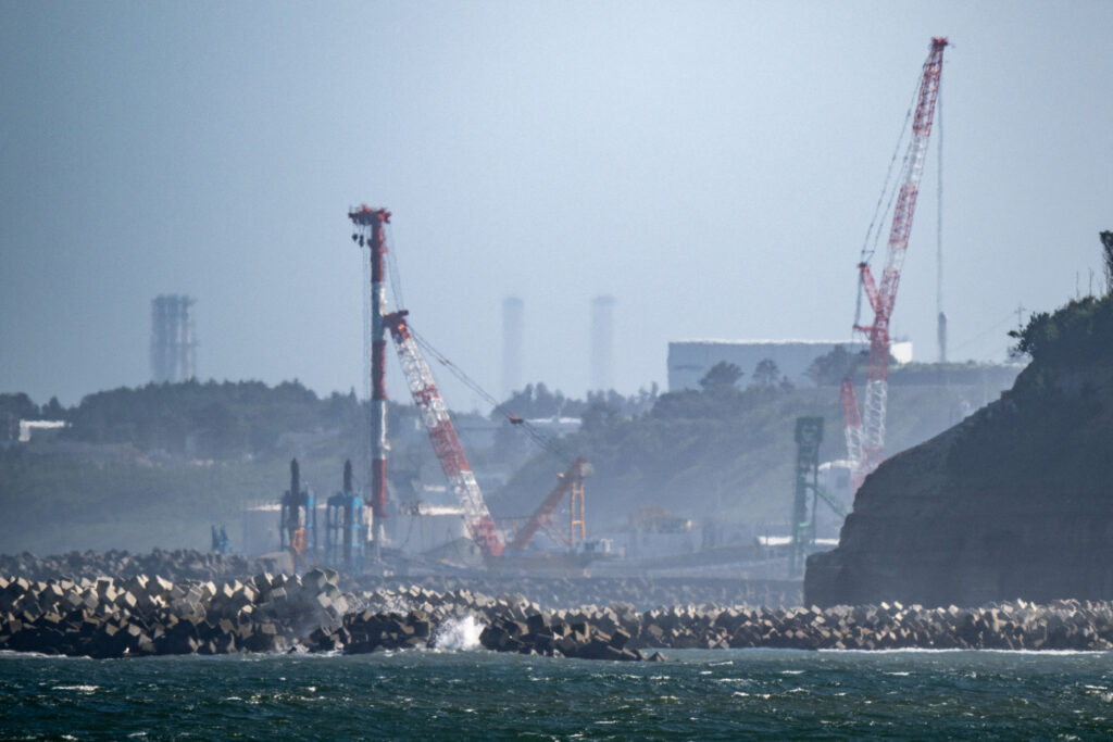 Japanese industry minister Yasutoshi Nishimura, during a visit to Fukushima Prefecture pledged efforts to deal with misinformation regarding the release of tritium-containing treated water into the sea. (AFP)