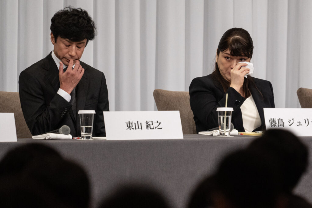 New president of Johnny & Associates Noriyuki Higashiyama (L) and outgoing president Julie Keiko Fujishima during the press conference that was held on September 7, following the agency admitting that the late founder sexually abused multiple young aspiring stars. (AFP)  