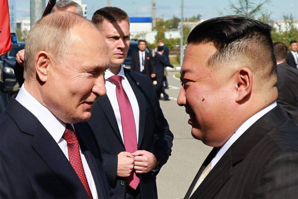 In this pool photo distributed by Sputnik agency, Russia's President Vladimir Putin (L) shakes hands with North Korea's leader Kim Jong Un during their meeting at the Vostochny Cosmodrome in Amur region on September 13, 2023. (AFP)