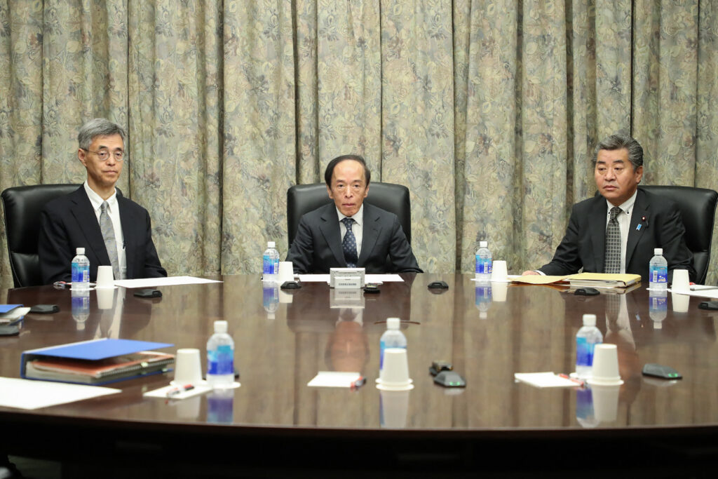 Bank of Japan governor Kazuo Ueda (C) attends a meeting with policy board members on September 22. (AFP)