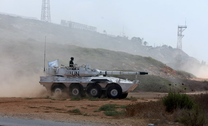 A United Nations peacekeeper (UNIFIL) is pictured on a UN armoured vehicle in Naqoura, near the border with Israel, southern Lebanon, August 31, 2023. (Reuters)