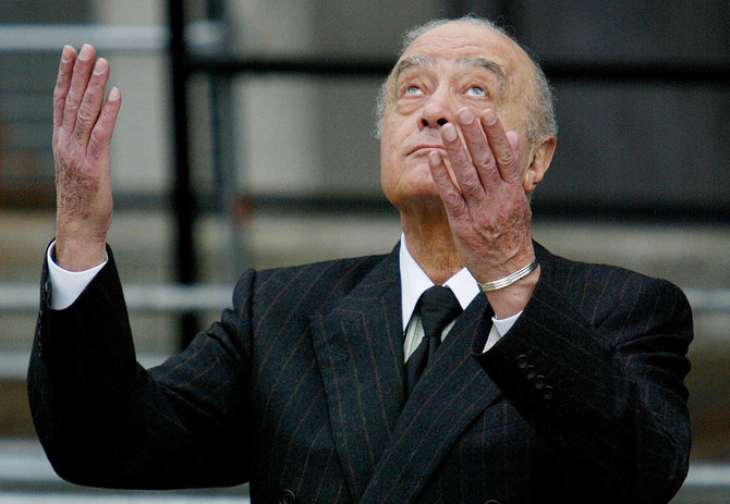 Mohamed Al Fayed gestures as he leaves the opening of the British inquest into the 1997 death of Britain's Princess Diana, in London on January 6, 2004. (REUTERS/File Photo)