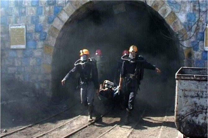 IRNA showed footage of other workers at the site trying to recover the remains of their colleagues’ bodies from under the rubble (IRNA)