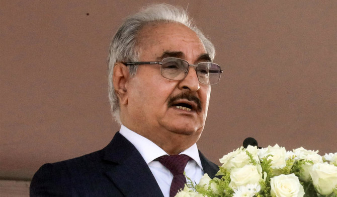 Libya's eastern military chief Khalifa Haftar gives a speech during a rally marking the 71st anniversary of the country's independence from Italy in the eastern city of Benghazi on December 24, 2022. (AFP)