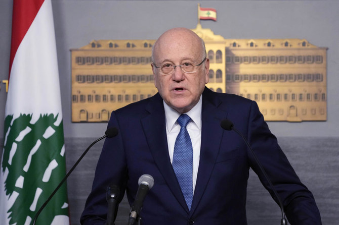 Over a thousand Syrian refugees each week fleeing to Lebanon from their country’s worsening economic and financial conditions “could create harsh imbalances” in the small Mediterranean nation, caretaker Prime Minister Najib Mikati warned Thursday. (AP/File)