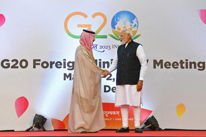 Saudi Foreign Minister Prince Faisal bin Farhan meets India’s Premier Narendra Modi during G20 foreign ministers’ meeting. (AFP/File)