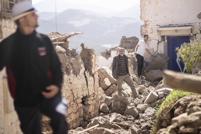 Residents inspect their damaged homes after an earthquake in Moulay Ibrahim village, near Marrakech, Morocco on Sept. 9, 2023. (AP)