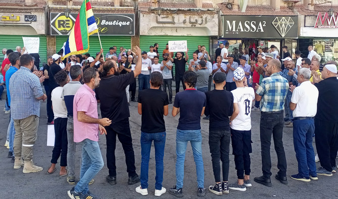 People protest in the Syria’s southern city of Sweida on September 5, 2023.