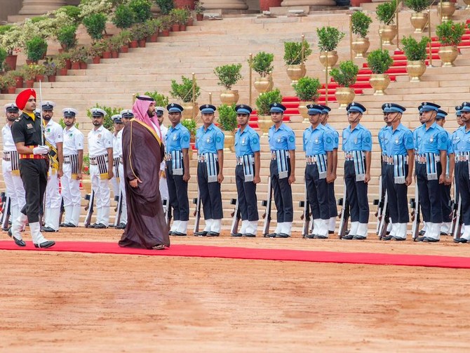 Saudi Arabia’s Crown Prince Mohammed bin Salman troops the line during the ceremonial reception at Rastrapati Bhawan in New Delhi. (Twitter: @spagov)