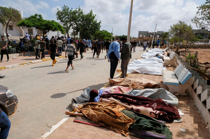 Rescue teams were working day and night to recover many other bodies scattered in the streets and under the rubble in Derna. (Reuters)