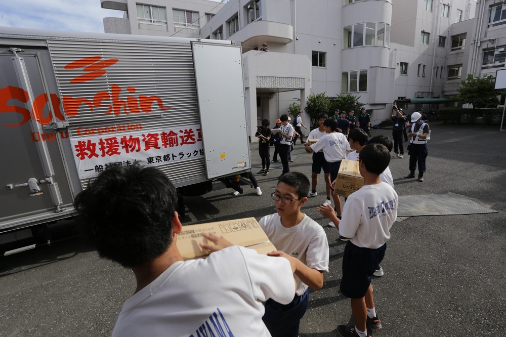 Schoolchildren aged 12 to 14 participated in drills in preparation for a big earthquake on the 100th anniversary of the Great Tokyo Earthquake that killed over 140,000 people in 1923. (ANJ)