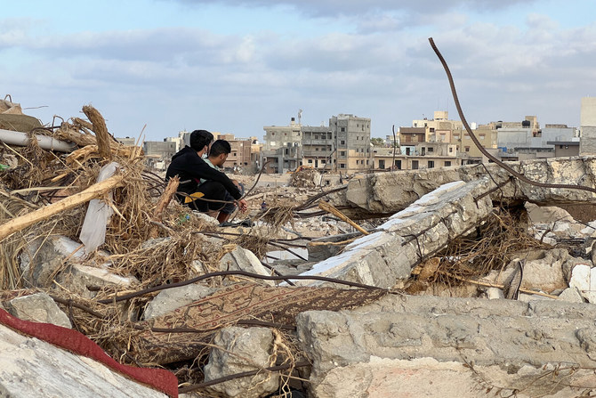 Ten days after a tsunami-scale flash flood ripped through the coastal city, razing entire neighbourhoods, many of the traumatised survivors are still waiting to learn the fate of missing relatives (AFP)