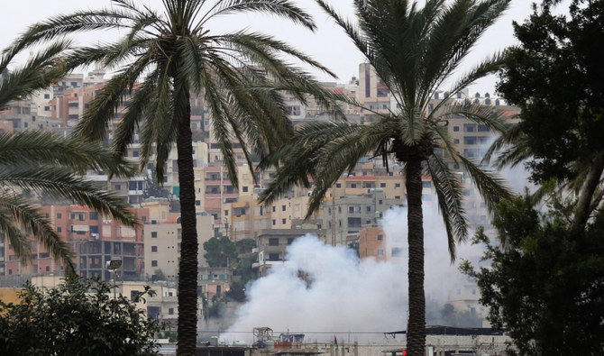 Smoke rises during clashes in Ein El-Hilweh camp, Lebanon’s largest Palestinian refugee camp, near the southern coastal city of Sidon, on February 28, 2017. (AFP/File)