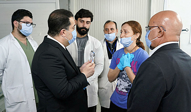 Prime Minister Mohammed Shia Al-Sudani on Thursday visited injured patients and the families of victims at hospitals in northern Iraq. (Reuters)