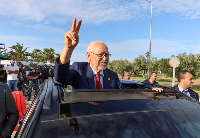Islamist Ennahda party leader Rached Ghannouchi gestures outside Judicial Pole of Counter-Terrorism after a Tunisian judge postponed a terrorism hearing against him in Tunis. (REUTERS)
