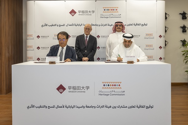 Iwai Fumio, ambassador of Japan in Saudi Arabia, oversees the signing of the agreement between Dr. Jasser and Dr. HASEGAWA So. (Supplied)