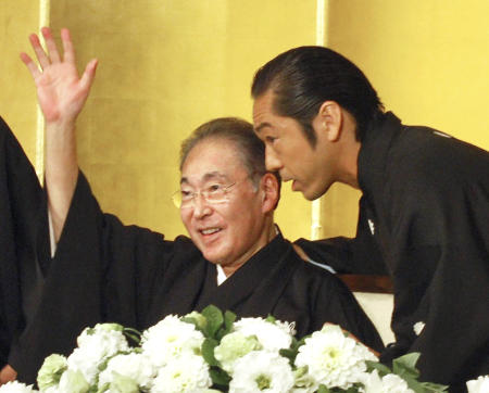 Eno Ichikawa (left) and his son Chusha Ichikawa attend a press conference in Tokyo, Japan in 2011. (Kyodo News via AP)