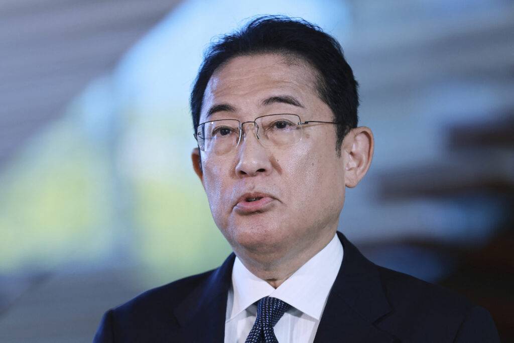 Kishida said that promoting the development and dissemination of technologies to confirm and verify senders of information is effective in combating fake images and information created by generative AI. (AFP)