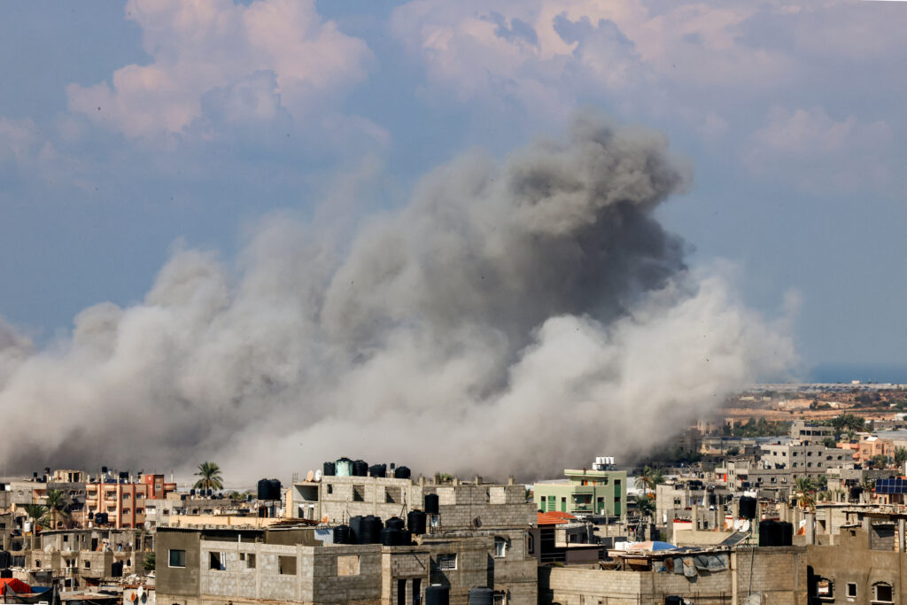 Smoke billows after an Israeli air strike in Rafah in the southern Gaza Strip on October 16. (AFP)