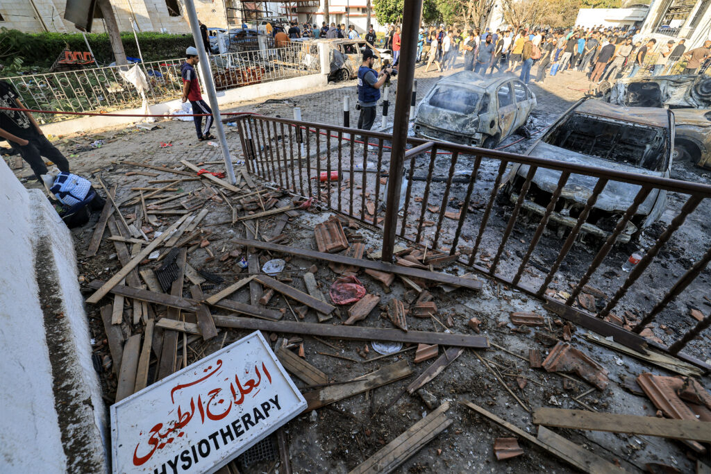 The Israeli military occupation claims that the hospital was damaged by an errant missile launched by Palestinian Islamic Jihad, while the Palestinians say it was a missile attack from the Israeli military. (AFP)