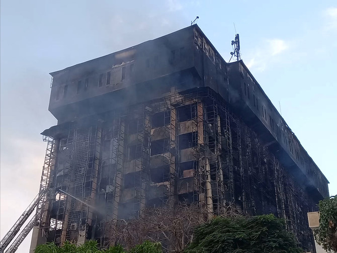 The blaze ripped through the multistory police headquarters in the Suez Canal province of Ismailia. (Mimi Eroq via Reuters)