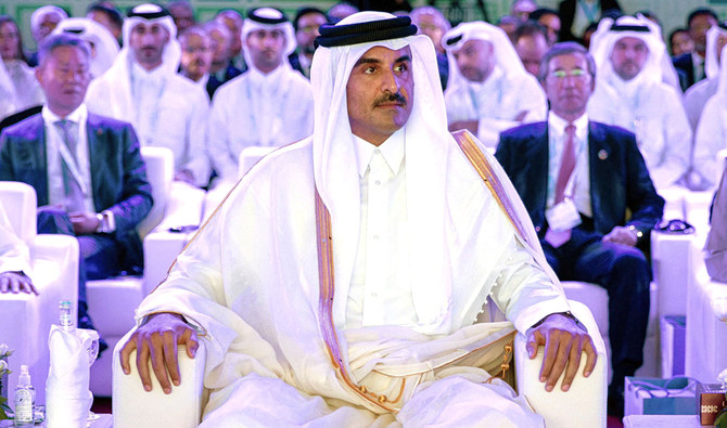 Qatar’s Emir Sheikh Tamim bin Hamad Al-Thani presided over a glitzy ceremony to lay the foundation stone at Ras Laffan, 80 km from Doha. (AFP)