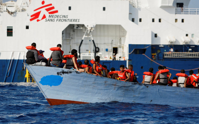 A group of 61 migrants on a wooden boat are rescued by crew members of the Geo Barents migrant rescue ship, operated by Medecins Sans Frontieres (Doctors Without Borders), in international waters off the coast of Libya in the central Mediterranean Sea September 28, 2023. (Reuters/File)