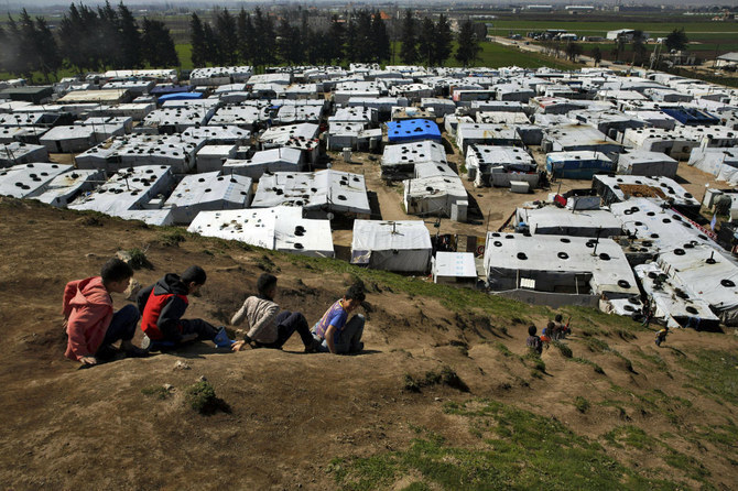 A surge in Syrian refugees entering Lebanon has ignited anti-migrant hostilities in the country, with some municipalities calling for a boycott of Syrian-operated shops and the expulsion of undocumented workers. (AP/File)