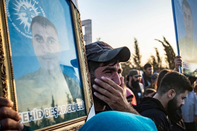 Turkiye has been bombing sites in the area, hitting civilian and military targets and infrastructure and causing casualties, according to Kurdish authorities. Above, a funeral for Asayish security forces killed in a Turkish drone strike, on Oct. 7, 2023. (AFP)