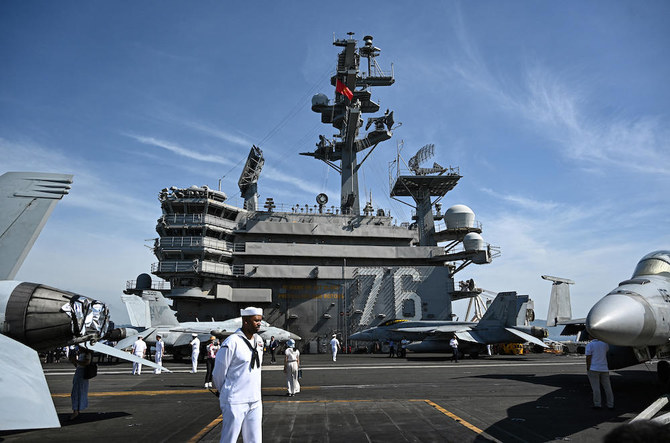 The visit of aircraft carrier Ronald Reagan comes after the US pledged to enhance the ‘regular visibility’ of its strategic military assets in the Washington Declaration. (AFP)