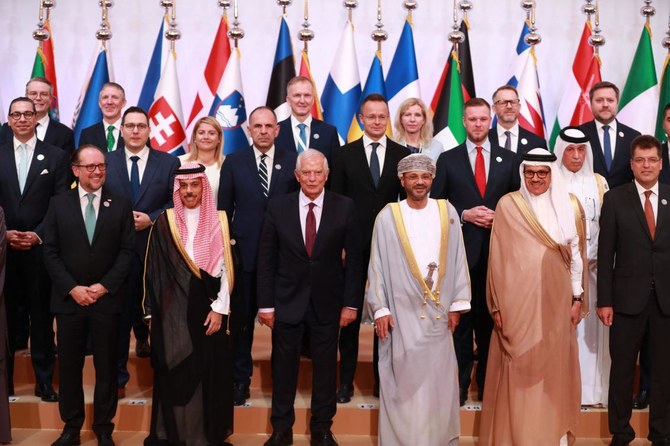 Participants in the 27th Joint GCC-EU Ministerial Council pose for a group photo in Muscat, Oman on Oct. 10, 2023. (AFP)