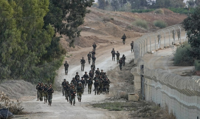 Israeli soldiers patrolling near Kibbutz Be'eri, Israel, Oct. 11, 2023. (AP)
