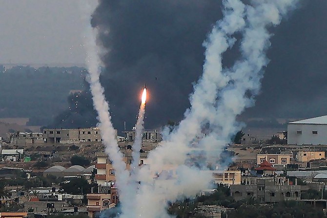 Palestinian militants fire rockets toward Israel from Rafah, southern Gaza Strip, on Oct. 11, 2023. (AFP)