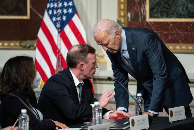 US President Joe Biden confers with his National Security Adviser Jake Sullivan in Washington DC on Oct. 11, 2023, following the Hamas terrorist attack on Israel./ (Getty Images/AFP)